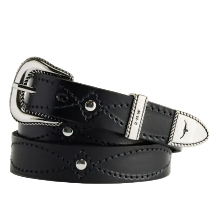 A black leather belt with silver-tone metal hardware, featuring decorative stitching and a silver buckle, coiled on a light beige background.