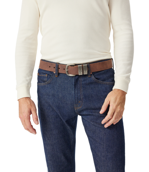 R.M.Williams - Drover Belt - Antique Nickel Hardware - Bark worn with denim jeans and a white long-sleeve shirt.