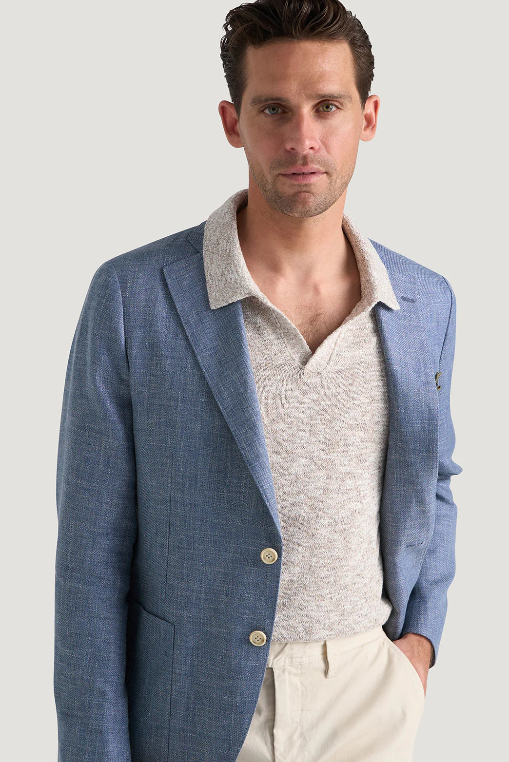 M.J.Bale - Beauford Jacket - Blue worn by a model, showcasing its elegant design and fit.