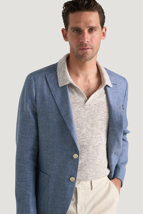 M.J.Bale - Beauford Jacket - Blue worn by a model, showcasing its elegant design and fit.
