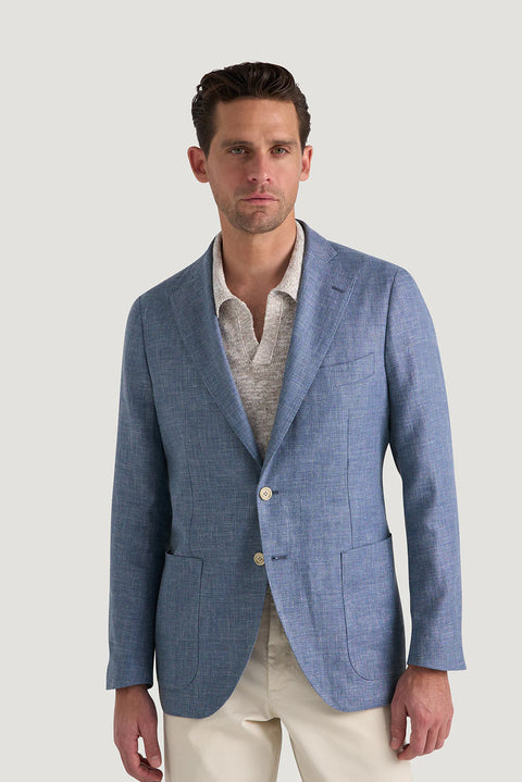 M.J.Bale - Beauford Jacket - Blue worn by a model showcasing its relaxed fit and stylish design.