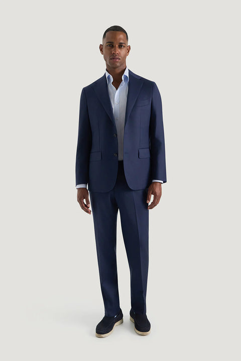 M.J. Bale - Beecher Shirt - Sky - MULTIBUY worn with a tailored navy suit, showcasing a sharp and refined look.