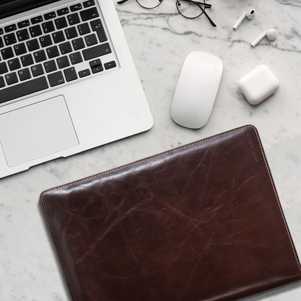 Jekyll and Hide - Zip Around A4 Tablet Folder - Tan | Coffee | Black on marble desk with laptop and accessories.