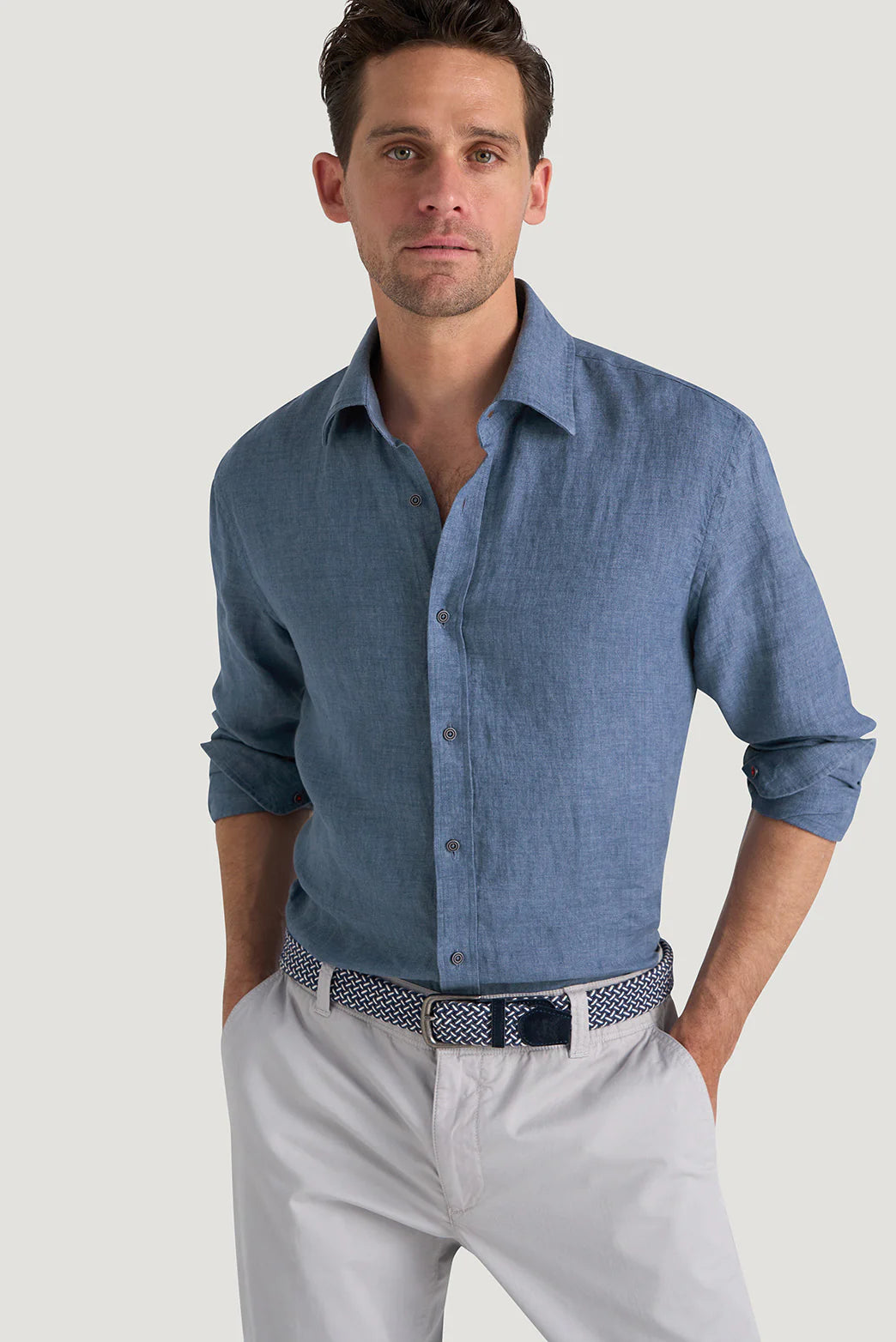 M.J. Bale - Bradfield Linen Shirt - Coastal Indigo - MULTIBUY worn by a man, featuring a casual fit and breathable linen fabric.