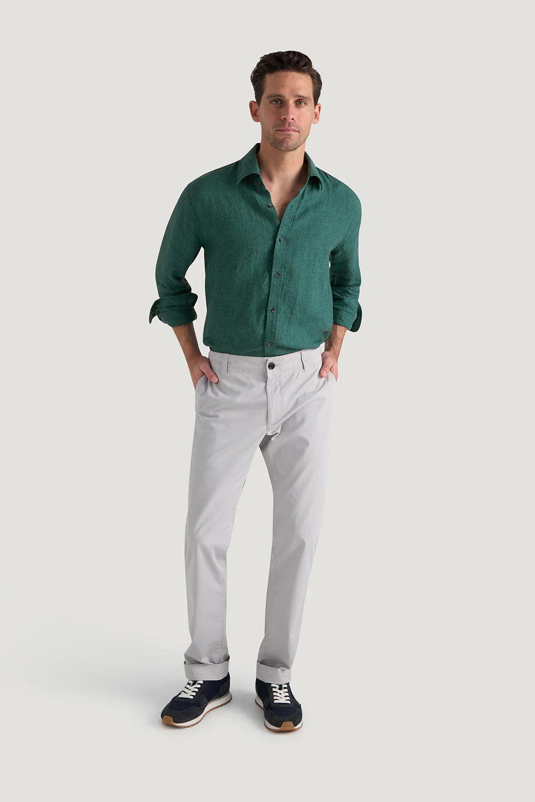 M.J. Bale - Bradfield Linen Shirt - Coastal Pine - MULTIBUY worn with light trousers and sneakers, captured in a casual setting.