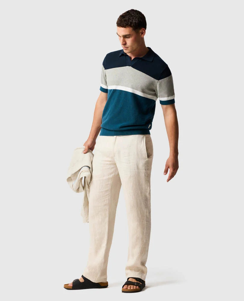 Rodd & Gunn - Brunswick Knit Polo - Teal model wearing stylish attire with light trousers and sandals.