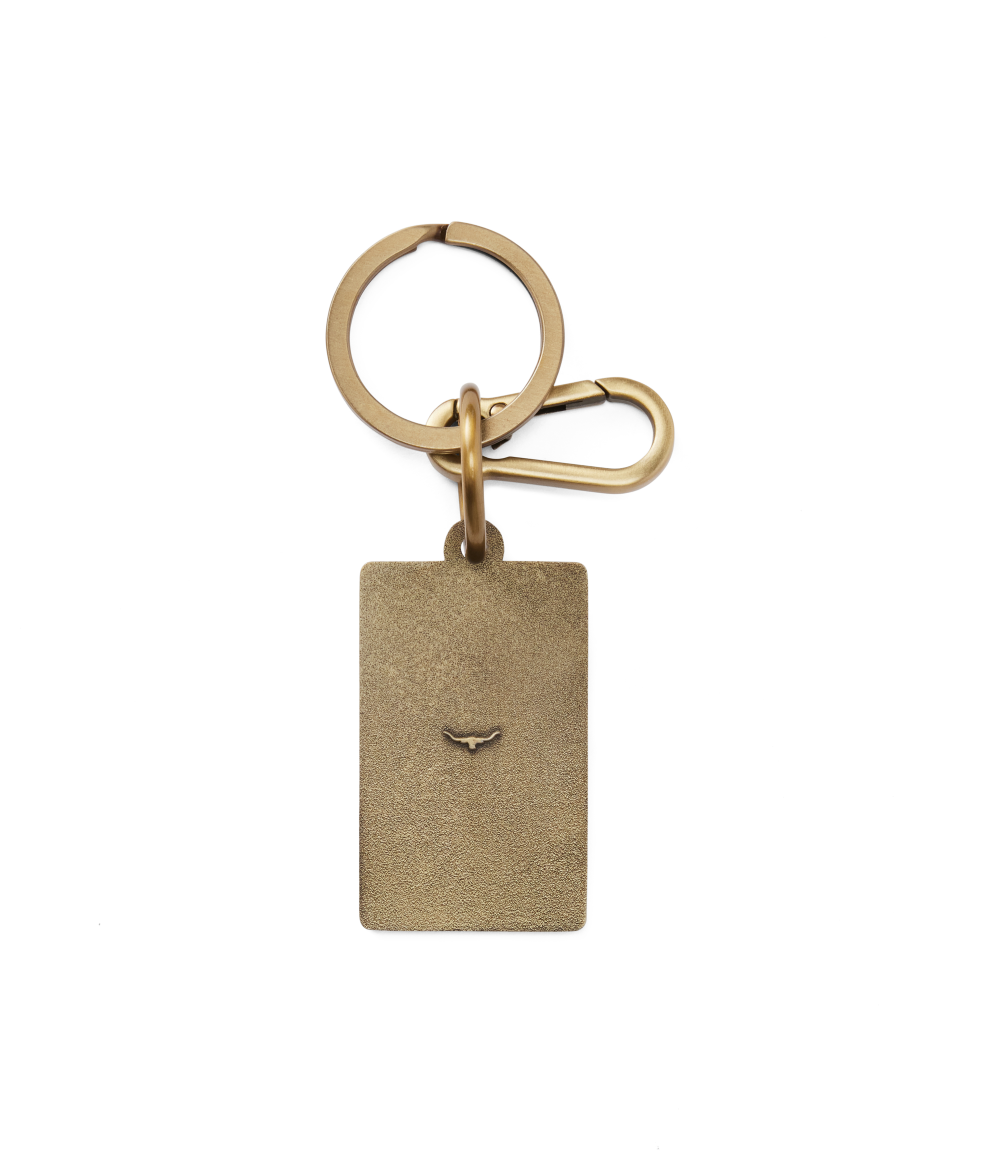 R.M.Williams - Heritage Logo Enamel Keyring - Chestnut showcasing brass hardware and classic design features.
