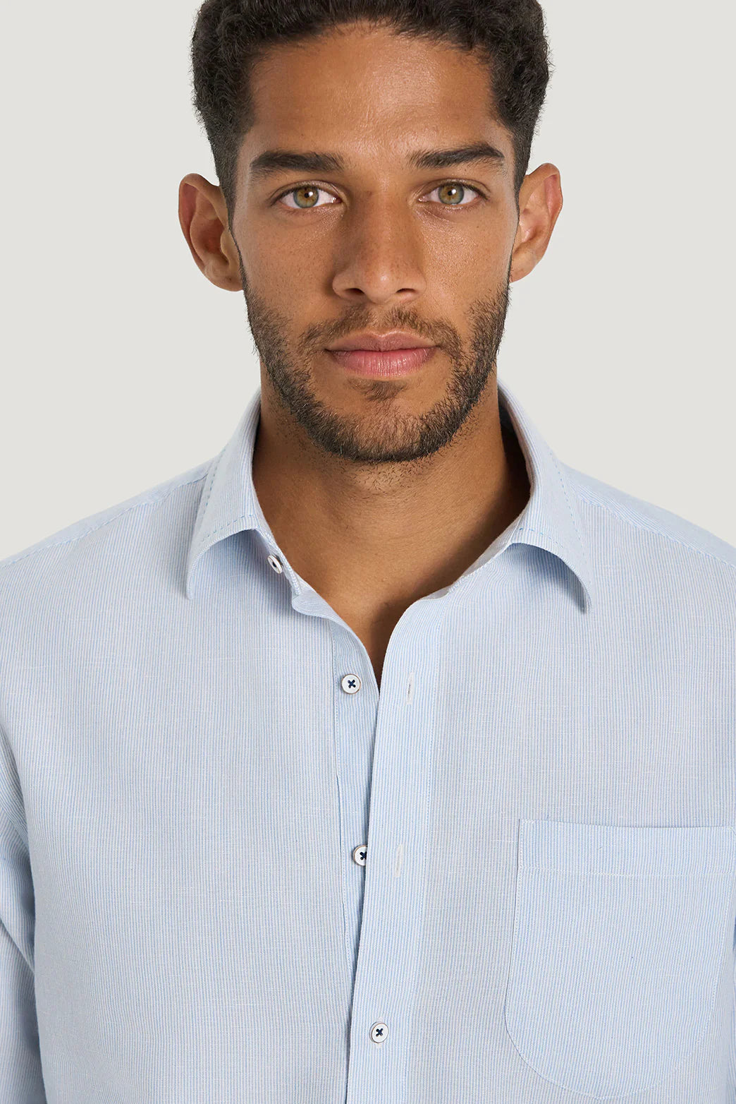 M.J. Bale - Caloundra Shirt - Micro Stripe - Sky - MULTIBUY worn by a model showcasing its casual fit and classic collar.