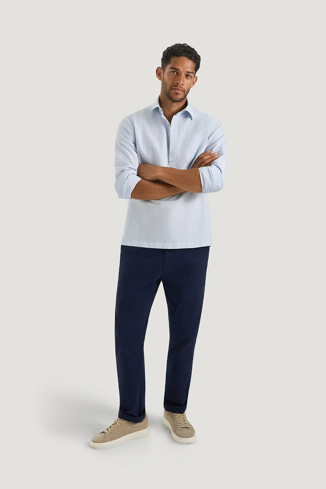 M.J. Bale - Caloundra Shirt - Micro Stripe - Sky - MULTIBUY worn by a man with casual pants and sneakers.