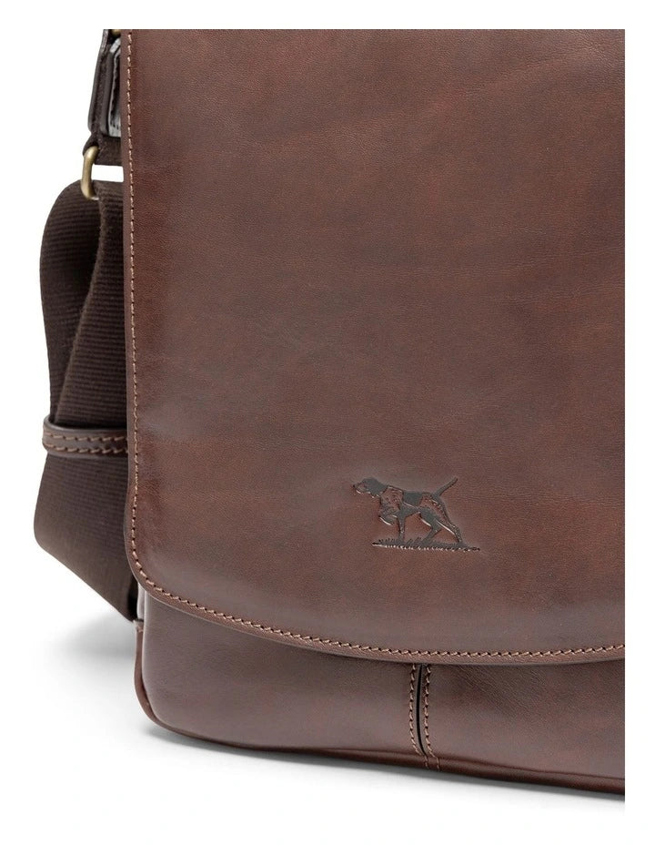 Rodd & Gunn - Cambridge Mini Messenger Bag - Chocolate with embossed logo detail on rich leather.