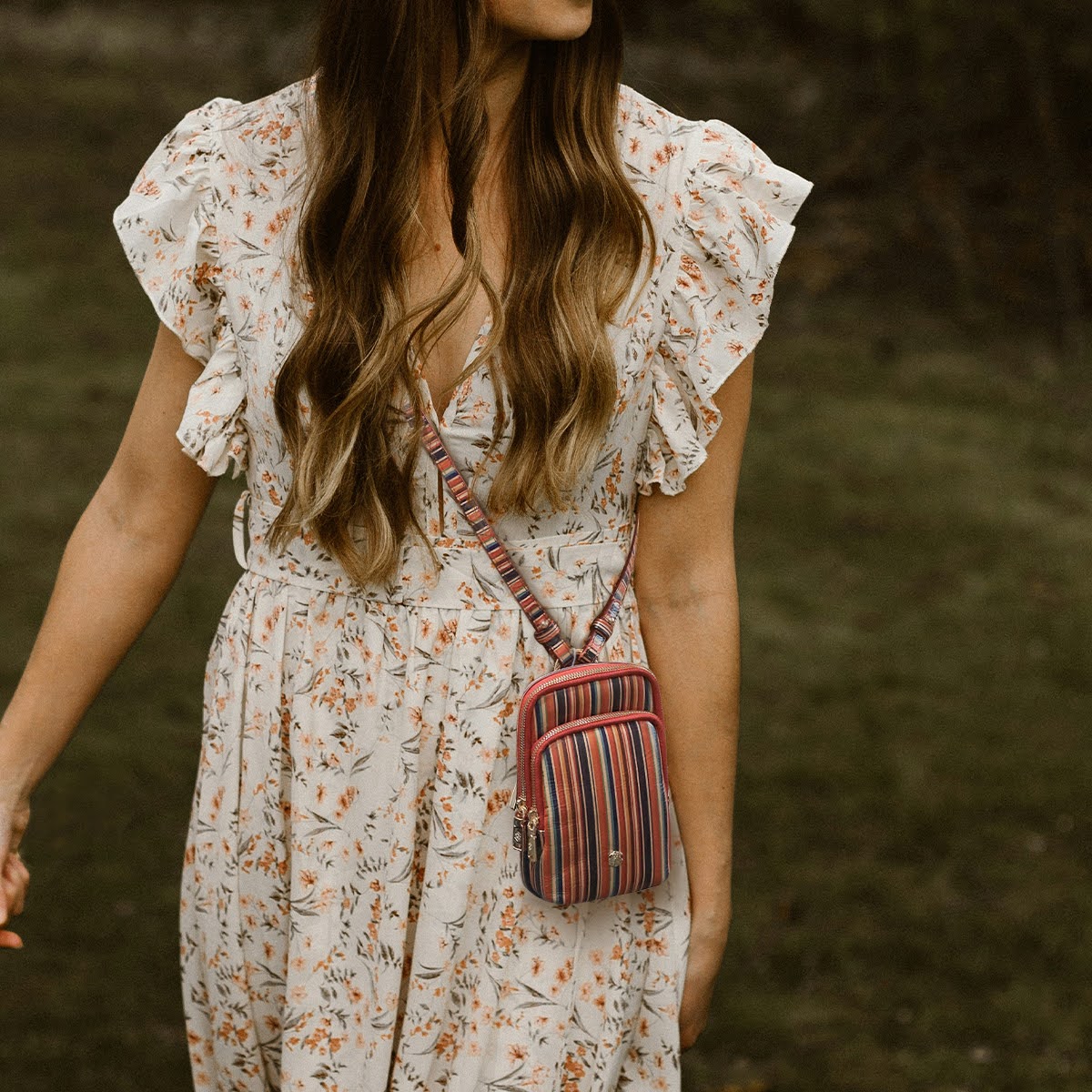 Jekyll and Hide - Womens Small Mobile Phone Sling Purse - Mulitple Colours in a floral dress with a crossbody style.