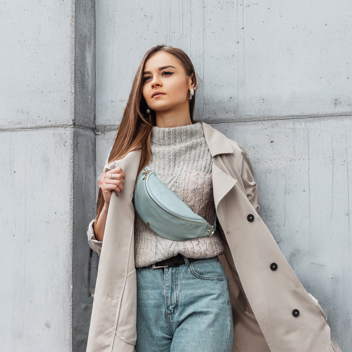 Jekyll and Hide - Womens Osaka Slim Leather Waist Bag - Tan and Multiple Colours displayed on a model in stylish outdoor attire.