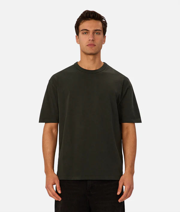 Industrie - The Del Sur Tee - Celtic - MULTIBUY, model wearing dark oversized t-shirt with relaxed fit.