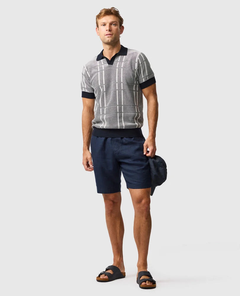 Rodd & Gunn - Dryden Bay Knit Polo - Eclipse worn by a man, showcasing jacquard design and comfortable fit.