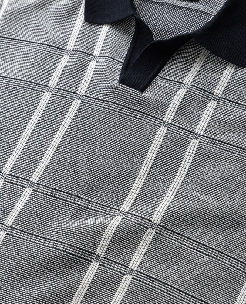 Rodd & Gunn - Dryden Bay Knit Polo - Eclipse featuring a stylish check jacquard design in navy and white.