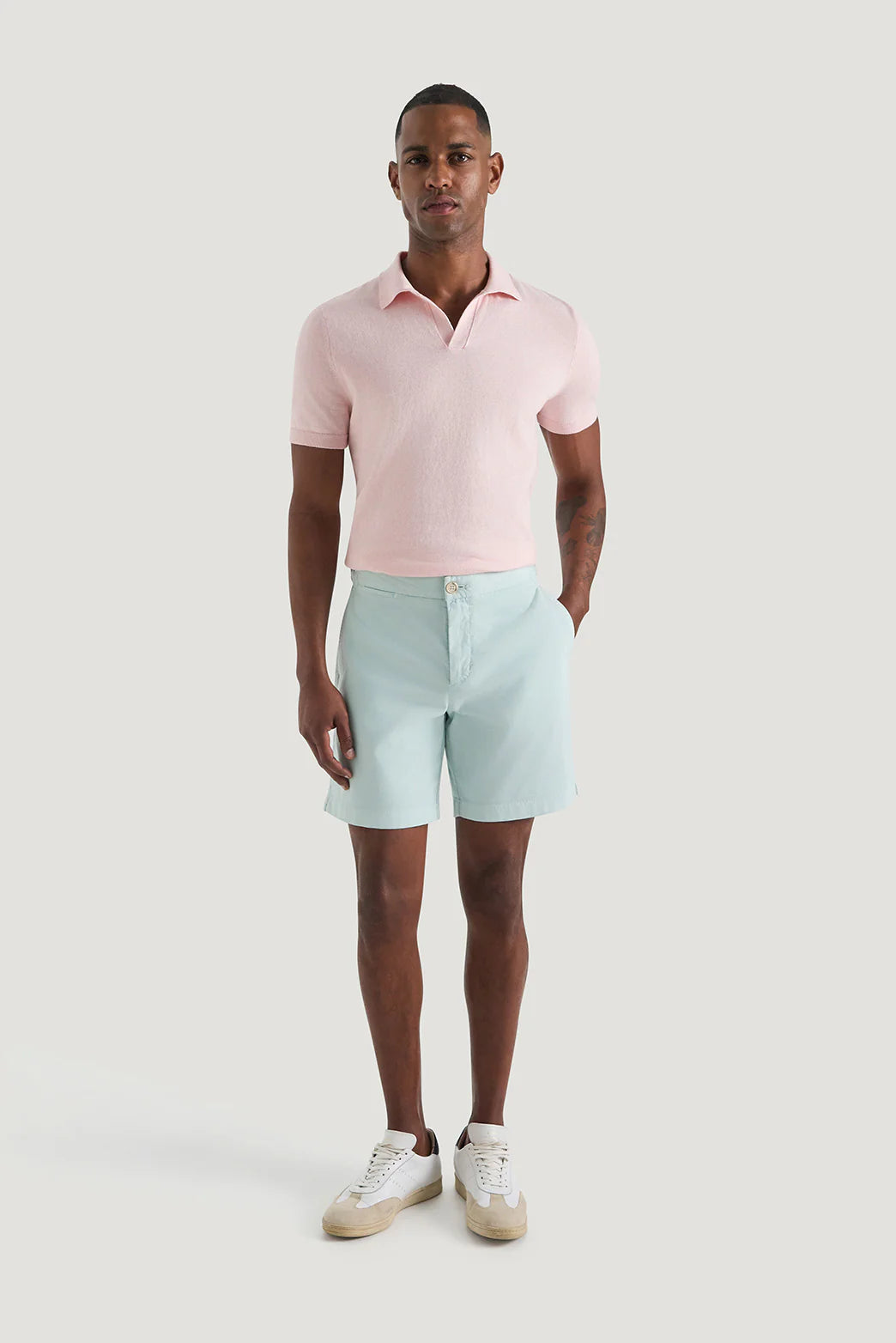 M.J. Bale - Farrelly Side Tab Short- Aqua worn with a pink polo shirt, showcasing stylish summer attire.