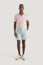 M.J. Bale - Farrelly Side Tab Short- Aqua worn with a pink polo shirt, showcasing stylish summer attire.