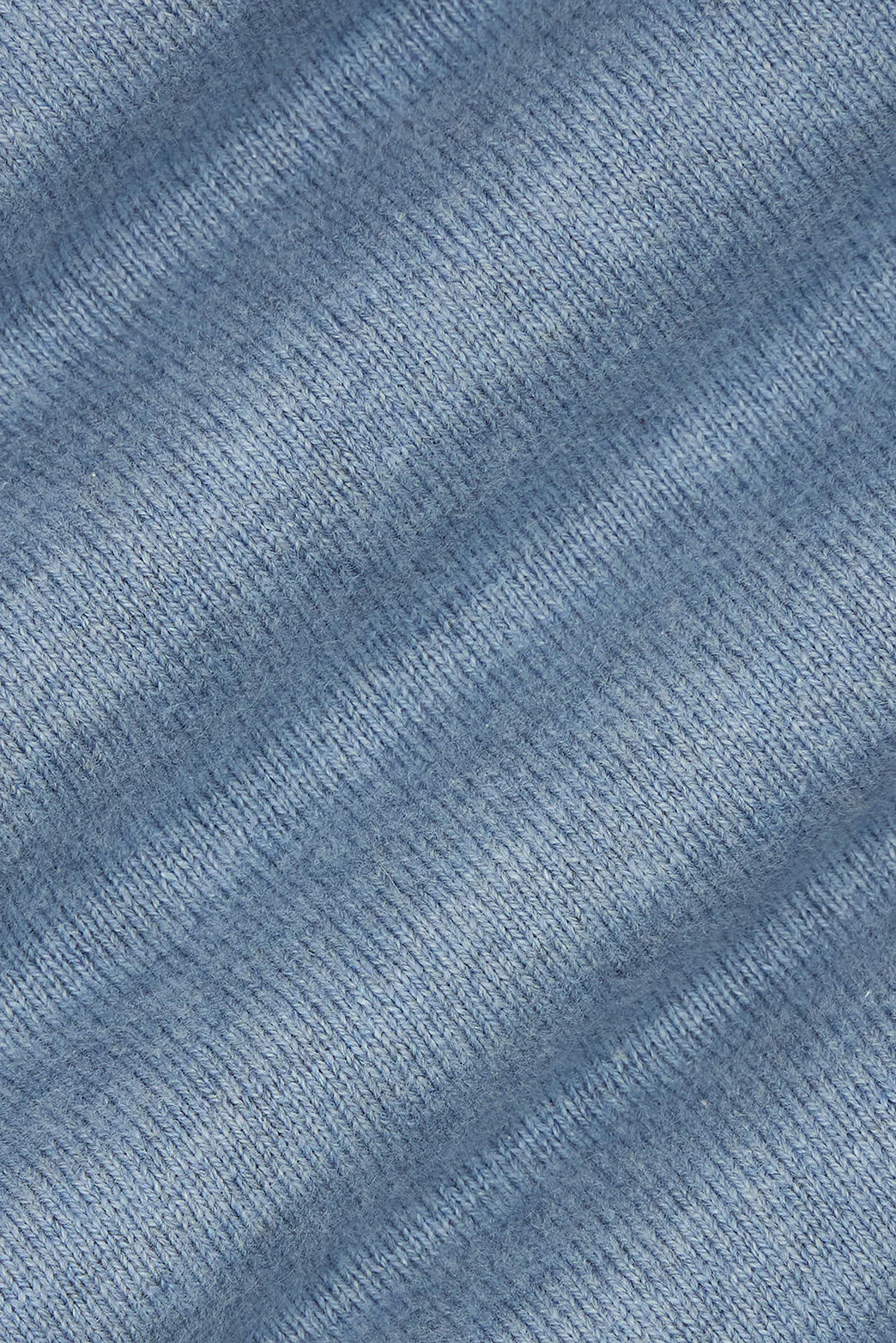 M.J.Bale - Furlong Polo - Cotton/Cashmere Blend - Blue Melange fabric texture in soft blue shades.