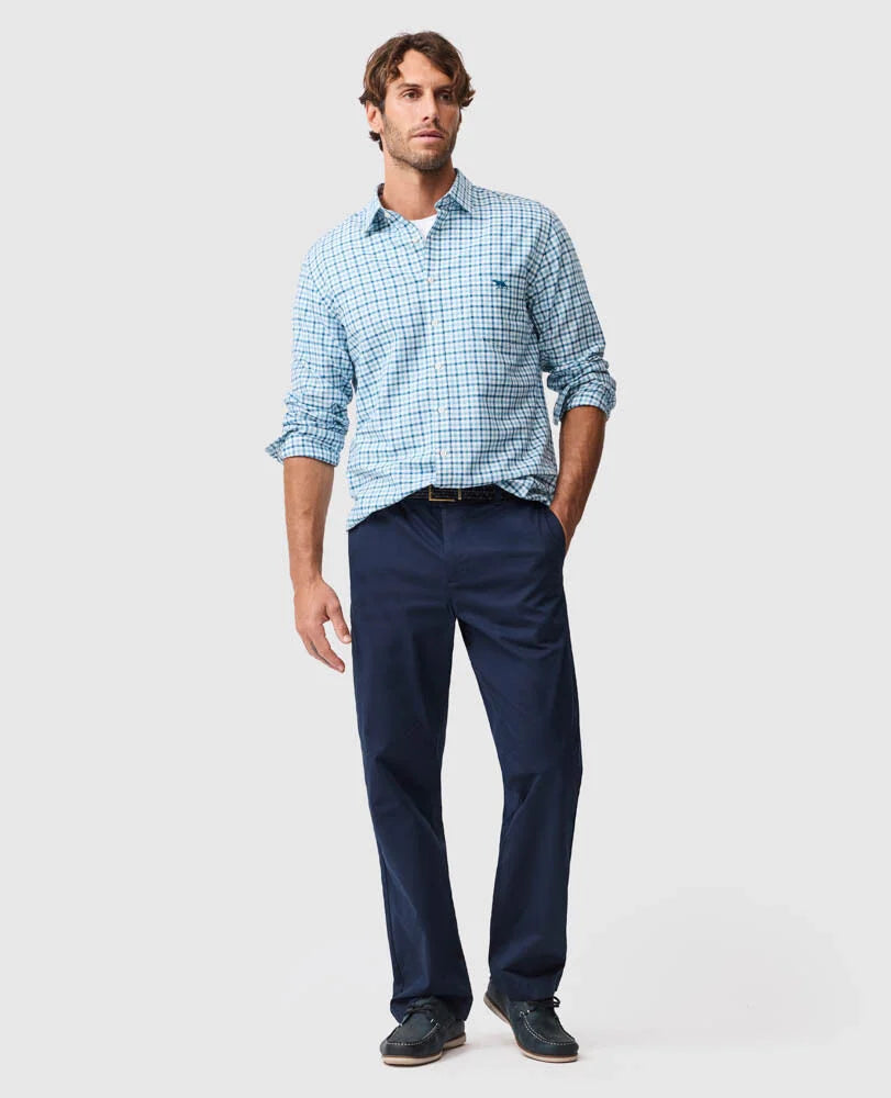 Rodd & Gunn - Gebbies Valley Linen Shirt - Check - Lagoon, worn by a model with navy pants, showcasing its stylish look.