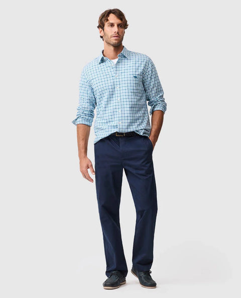 Rodd & Gunn - Gebbies Valley Linen Shirt - Check - Lagoon, worn by a model with navy pants, showcasing its stylish look.