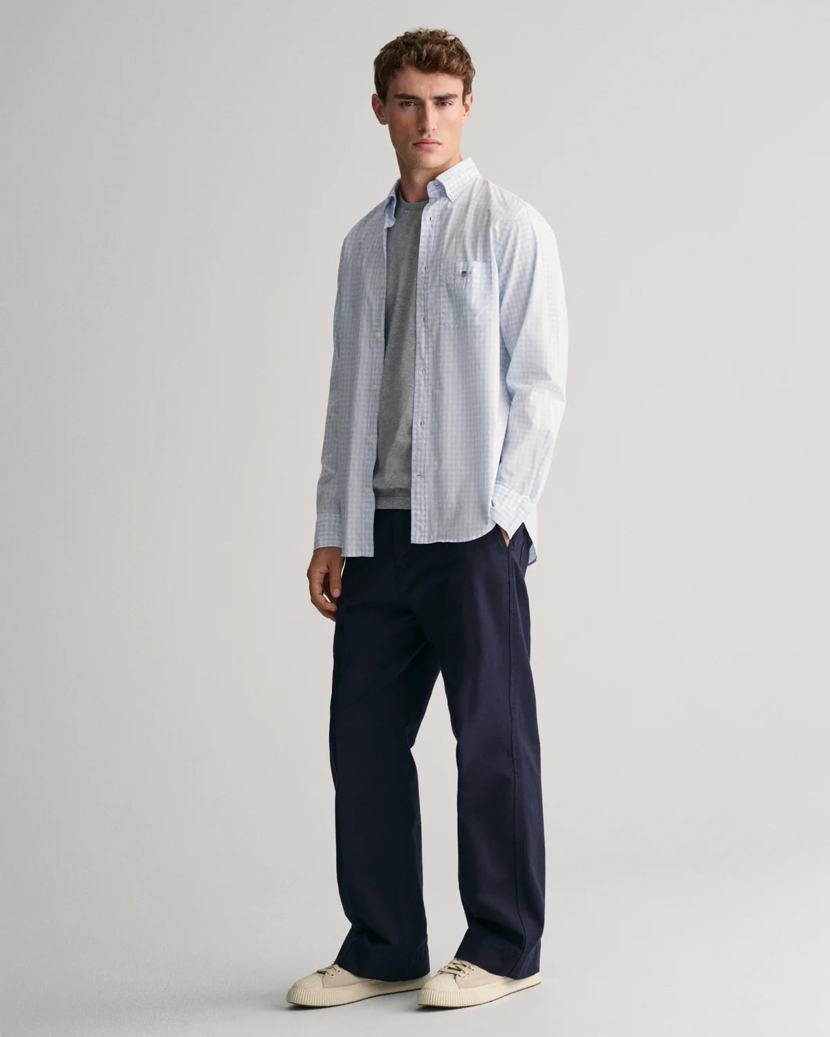 GANT - Poplin Shirt - Gingham - Light Blue & White worn by model showcasing a business-casual look.