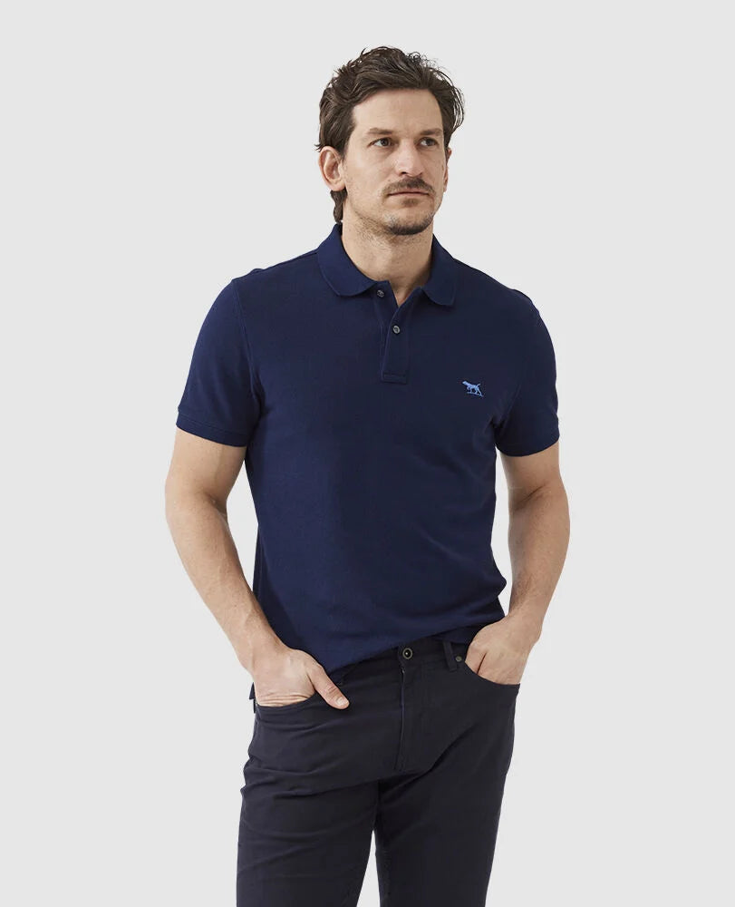 Rodd & Gunn - The Gunn Polo - Eclipse - MULTIBUY worn by a man in a navy pique polo shirt.