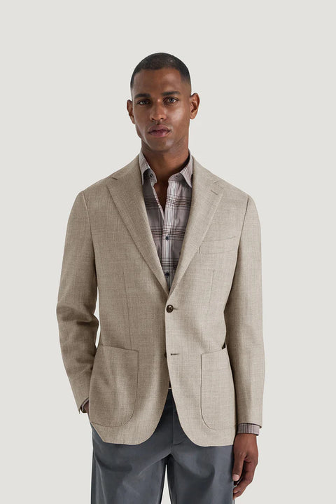 M.J.Bale - Hailwood Jacket - Light Brown worn by a model, showcasing its sophisticated design and texture.