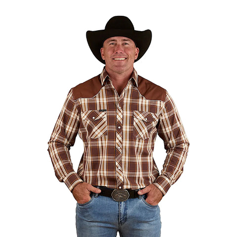 Ringers Western - Hamersley Western Shirt - Chocolate worn by a cowboy, showcasing its plaid design and western yoke panels.