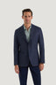 M.J. Bale - Hannigan Jacket - Navy worn by a man standing confidently in a stylish setting.