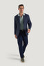 M.J. Bale - Hannigan Jacket - Navy worn by a model, showcasing a stylish combination with a knit shirt and casual pants.