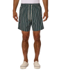 A man wearing dark green and white vertically striped drawstring shorts, paired with a white t-shirt and off-white sneakers, shown from the waist down on a light gray background.