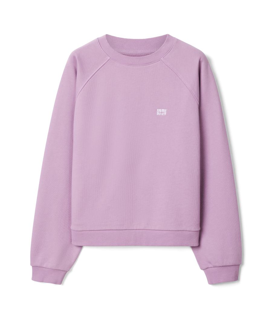 R.M.Williams - Heritage Easy Crew - Lilac featuring a relaxed fit, ribbed crew neck, and logo embroidery on a lilac organic cotton sweatshirt.