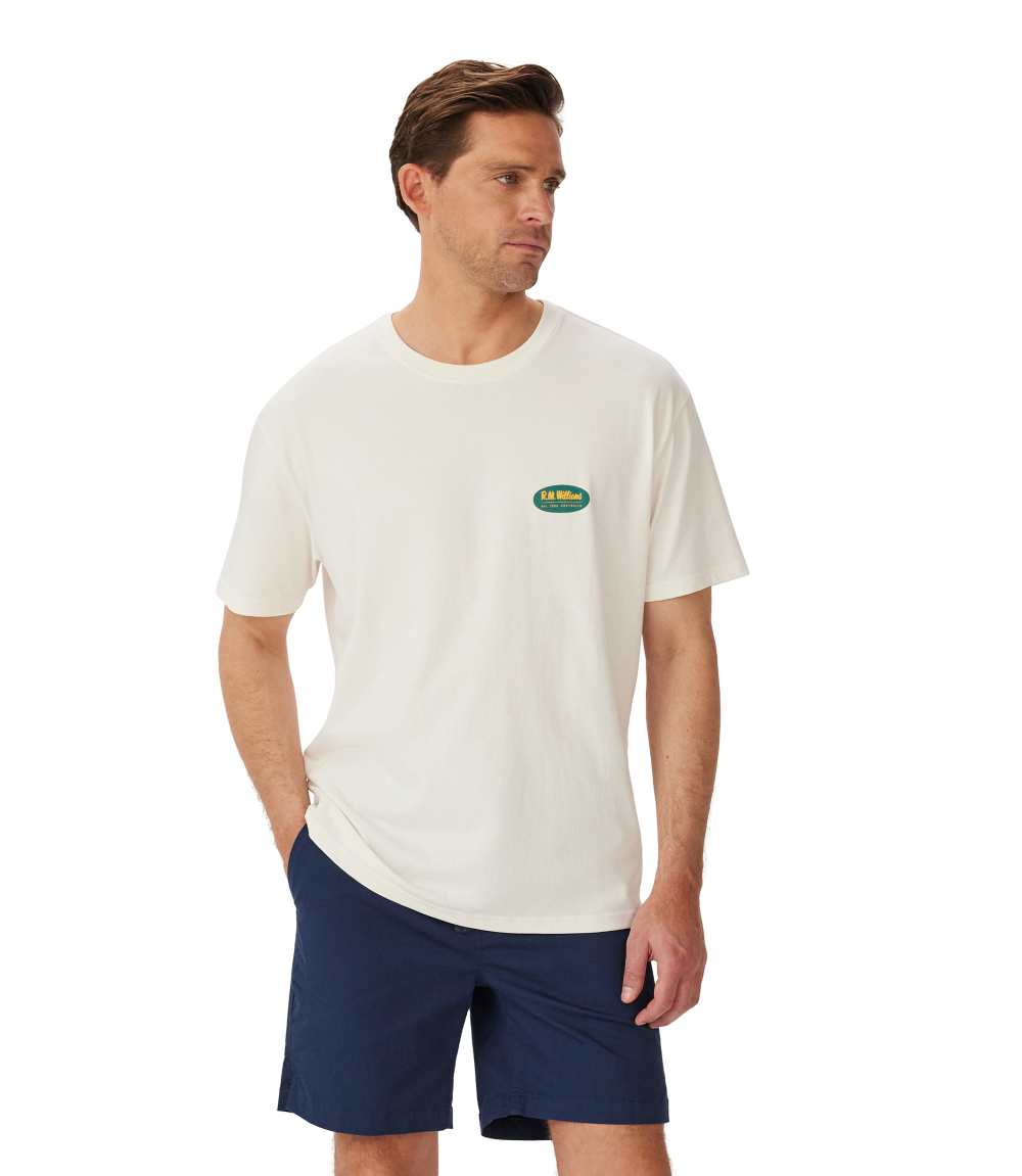 R.M.Williams - 90s Logo T-Shirt - White - NEED DESCRIPTION worn by a man, featuring a simple yet stylish design.