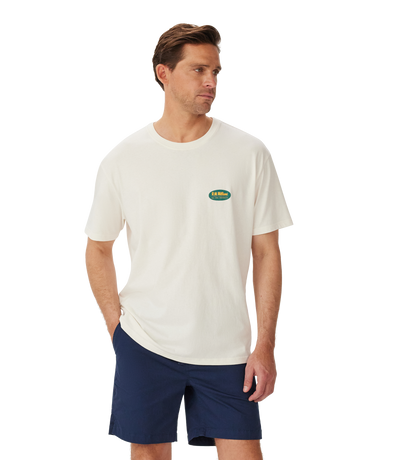 R.M.Williams - 90s Logo T-Shirt - White - NEED DESCRIPTION worn by a man, featuring a simple yet stylish design.