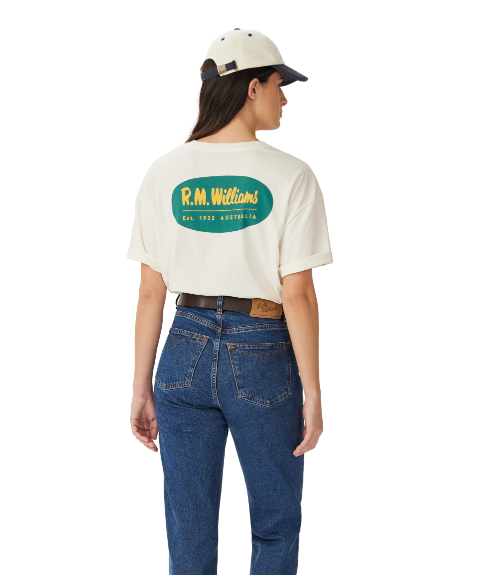 R.M.Williams - 90s Logo T-Shirt - White - featuring a woman wearing the logo t-shirt from behind.
