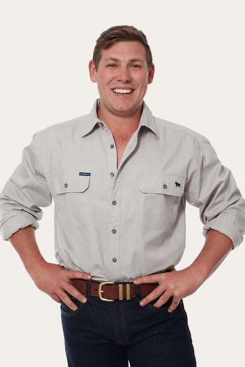 Ringers Western - King River  Work Shirt - Beige worn by a smiling man, showcasing double breast pockets and comfortable fit.