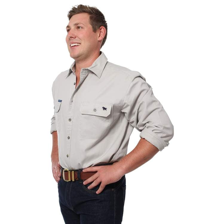 Ringers Western - King River Work Shirt - Beige modeled by a man, showcasing comfort and durability in outdoor wear.
