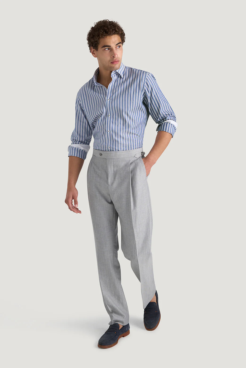 M.J. Bale - Kovacs Oxford Shirt - Stripe - Navy & White - MULTIBUY worn by a model with grey trousers.