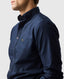 Man wearing a navy blue shirt with a small logo on a light gray background - Rodd & Gunn - Gunn Oxford Shirt - Eclipse