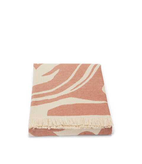 R.M.Williams - Longhorn Towel - Rustic Brown folded towel with a unique design and fringed edges.
