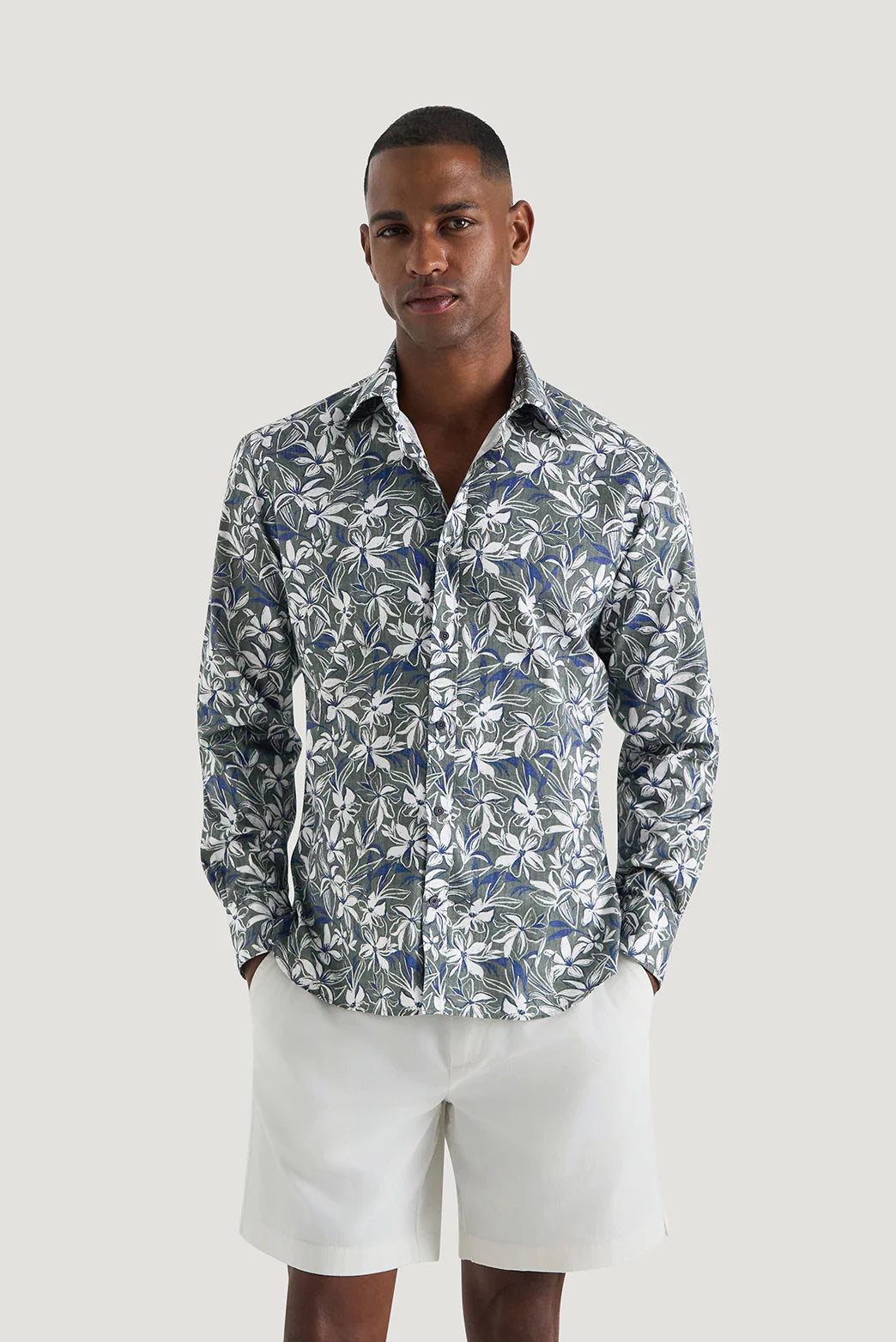 M.J. Bale - Marcello Floral Shirt - Green Navy & White - MULTIBUY worn by a model, featuring a seasonal floral print.