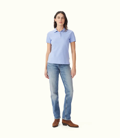 R.M.Williams women's polo shirt worn with denim jeans.