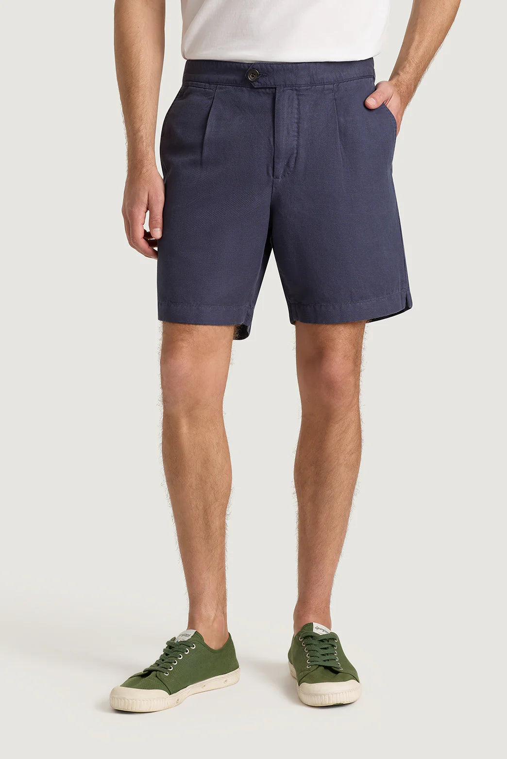M.J. Bale - Menorca Side Tab Short- Denim displayed on a model wearing green sneakers.