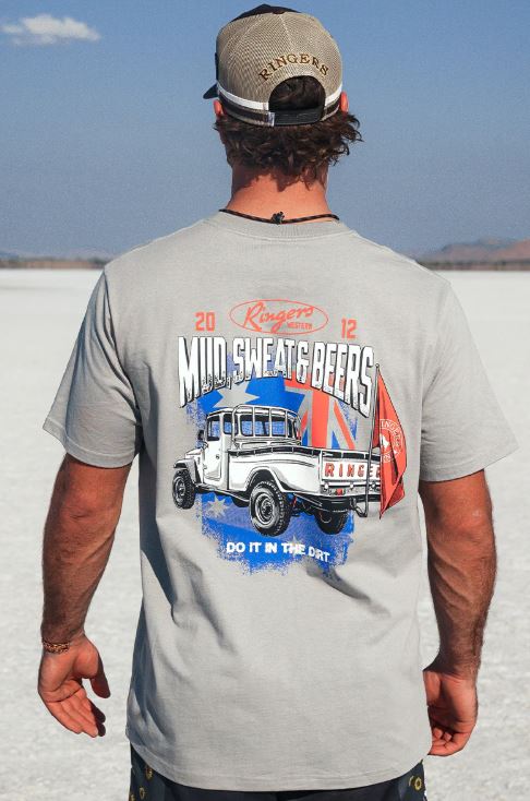 Ringers Western - Mud Sweat Beers Loose Fit T-Shirt - Cement worn by a man outdoors with a vintage ute graphic.