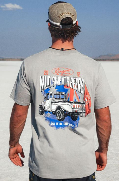 Ringers Western - Mud Sweat Beers Loose Fit T-Shirt - Cement worn by a man outdoors with a vintage ute graphic.