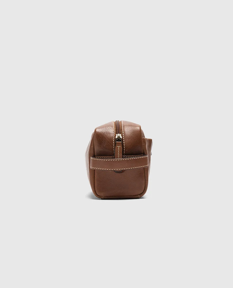 Rodd & Gunn - Princeton Washbag - Cognac side view showing external zip pocket and leather tab.