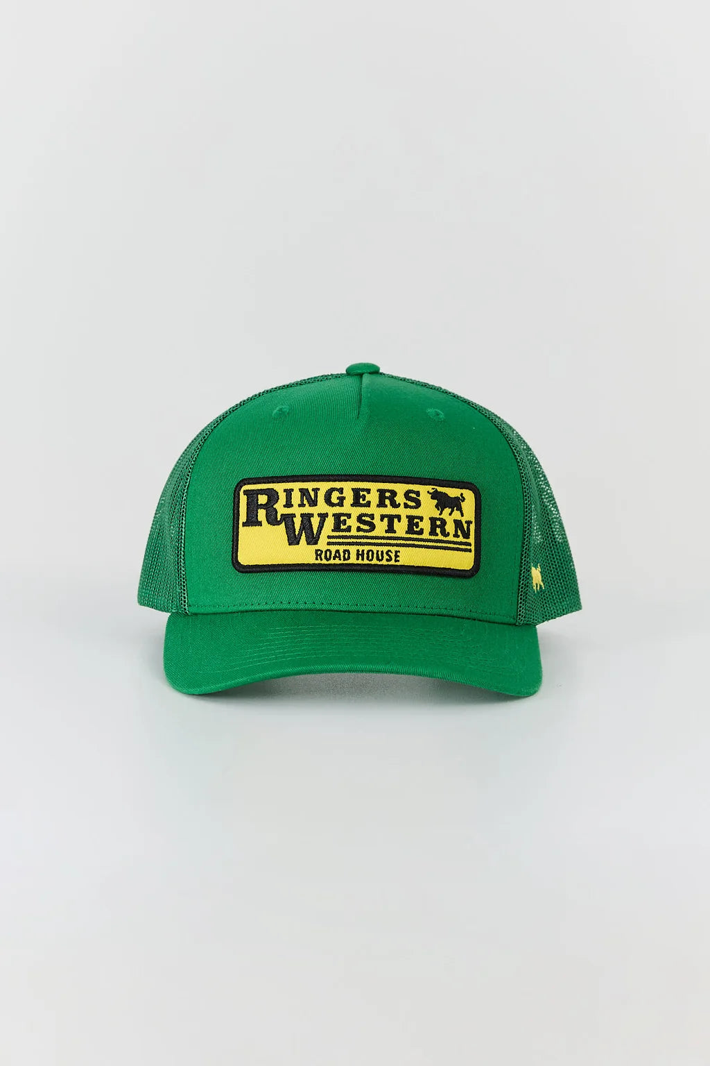 A green trucker-style cap with a yellow and black 'Ringers Western Road House' patch on the front, set against a plain light gray background.
