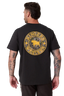 A man viewed from the back wearing a black t-shirt with a large distressed yellow circular graphic on the back that reads 'Ringer's Western' with a bull silhouette. The background is a clean, light gray studio backdrop.