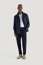 M.J. Bale - Rhode Trouser - Navy worn with a navy jacket, showcasing a stylish and versatile outfit for men.