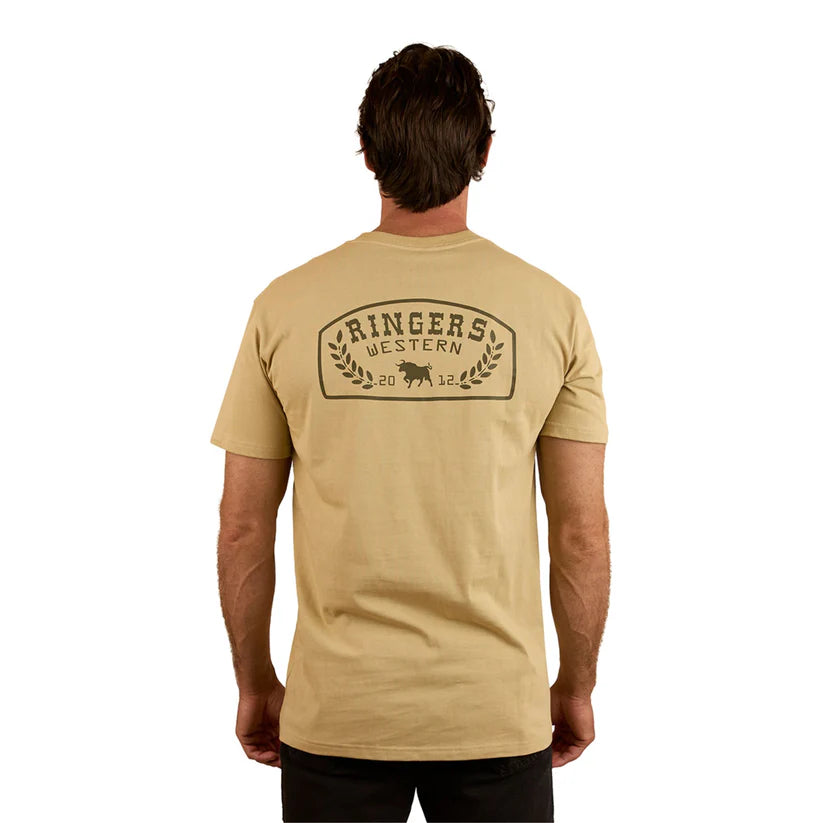 Ringers Western - Wheatbelt Stock Fit T-Shirt- Olive worn by model, showcasing back graphic design and comfort fit.